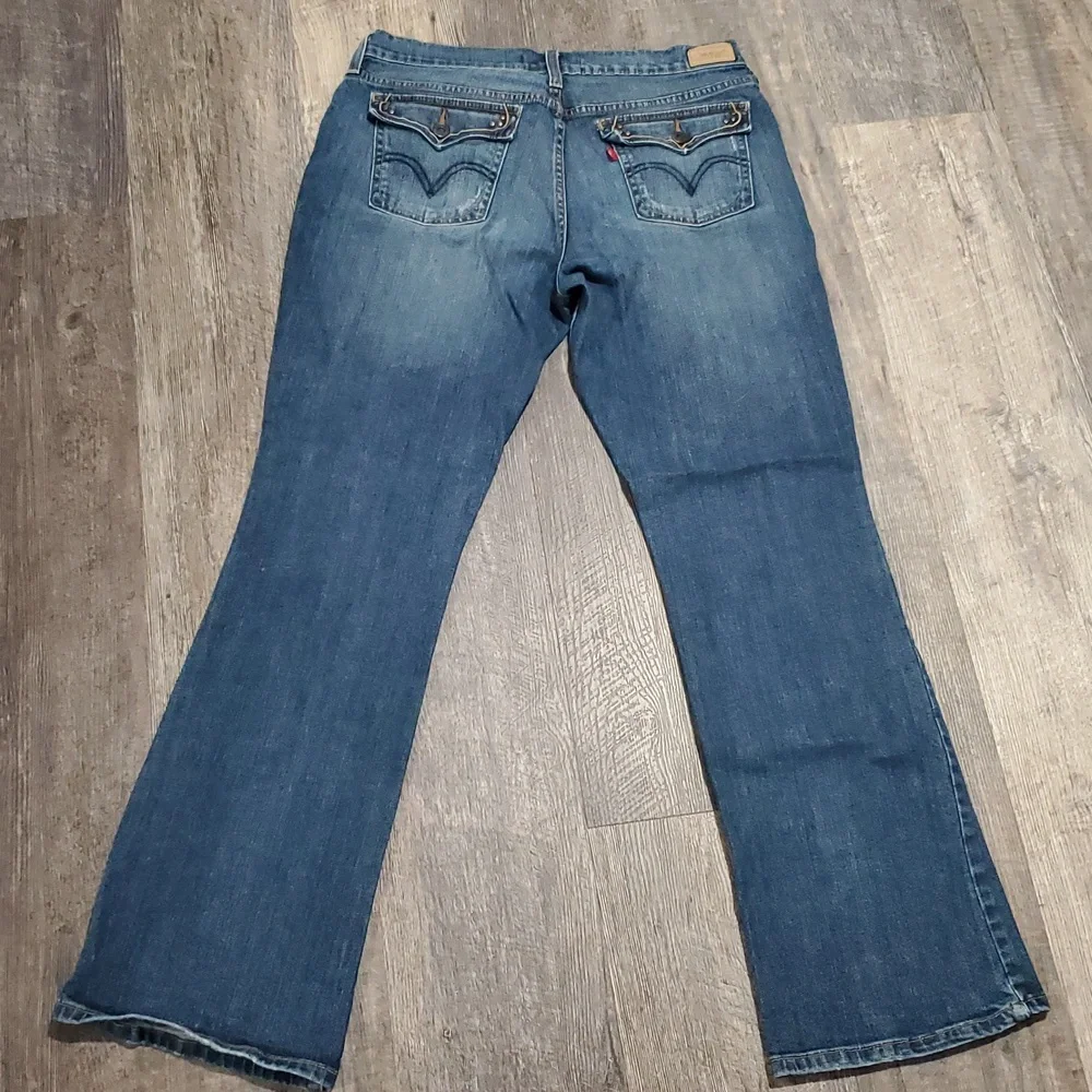 Levi 515 boot cut womens size 12M Blue Jeans Casual Medium Wash Distressed - Picture 8 of 12